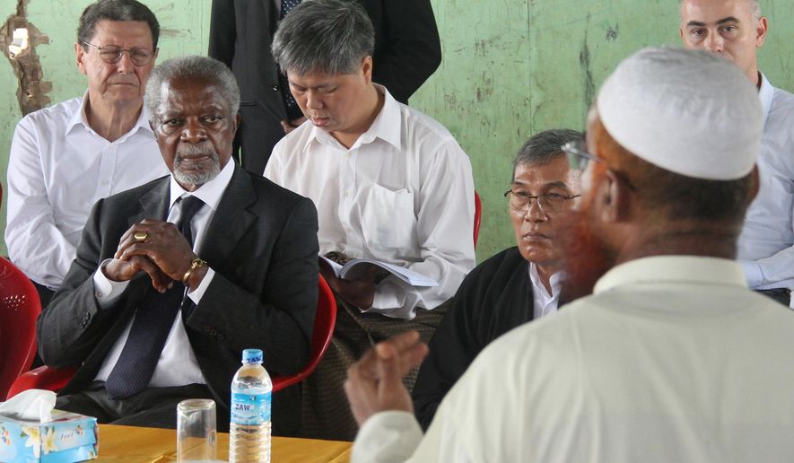 FILE - In this Sept. 27, 2016 file photo, former United Nations Secretary-General Kofi Annan, second left, listens to a Rohingya religious and community leader in the Internally Displaced People&#x27;s camps during a visit by the Rakhine Advisory Commission in Thetkabyin village, outside Sittwe, the capital of Rakhine state in Myanmar. Annan left the U.N. far more committed to combating poverty, promoting equality and fighting for human rights _ and until his death Saturday, Aug. 18, 2018, he was speaking out about the turbulent world he saw moving from nations working together to solve problems to growing nationalism. (AP Photo/Esther Htusan)