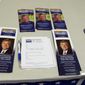 Campaign material for Republican gubernatorial candidate Mead Treadwell lies on display at Anchorage Baptist Temple, Sunday, Aug. 19, 2018, in Anchorage, Alaska. The event, in which candidates have tables and parishioners can meet them and ask them questions, has become a tradition for the church in the lead-up to elections. (AP Photo/Becky Bohrer)