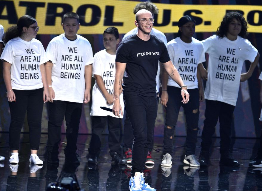 Logic performs "One Day" onstage at the MTV Video Music Awards at Radio City Music Hall on Monday, Aug. 20, 2018, in New York. (Photo by Chris Pizzello/Invision/AP)