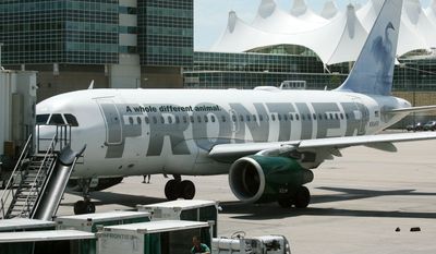 A Frontier Airlines Airbus arrives at a gate on the A concourse of Denver International Airport in this photograph taken on Tuesday, July 11, 2006. Frontier Airlines Holdings Inc. releases first-quarter earnings.  (AP Photo/David Zalubowski) ** FILE **