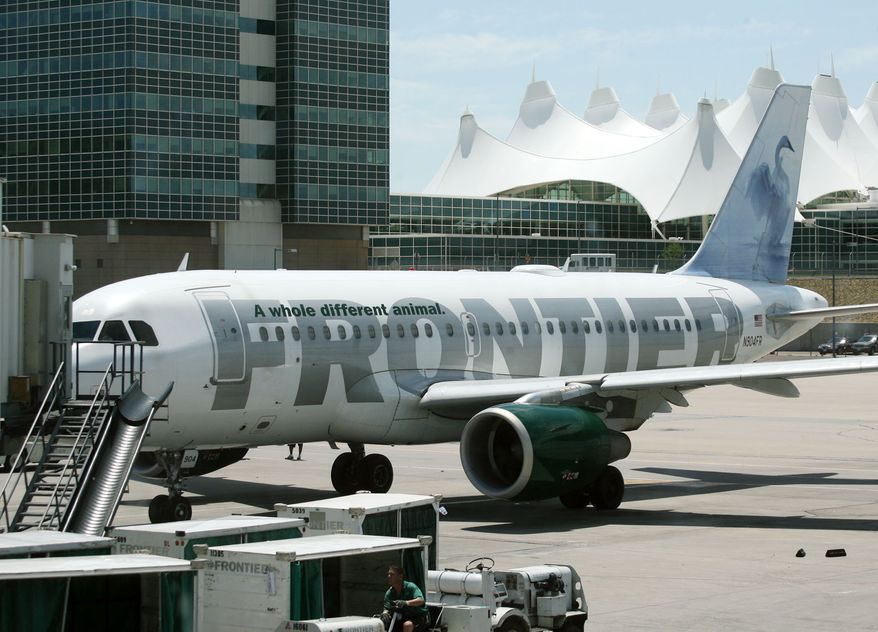 A Frontier Airlines Airbus arrives at a gate on the A concourse of Denver International Airport in this photograph taken on Tuesday, July 11, 2006. Frontier Airlines Holdings Inc. releases first-quarter earnings.  (AP Photo/David Zalubowski) ** FILE **