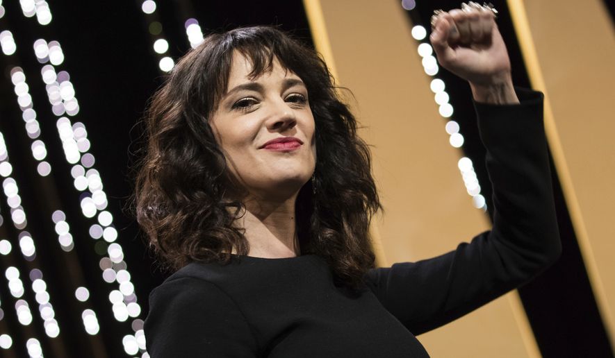 Actress Asia Argento gestures on stage during the closing ceremony of the 71st international film festival, Cannes, southern France, Saturday, May 19, 2018. (Vianney Le Caer)