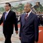 Malaysia&#39;s Prime Minister Mahathir Mohamad, right, walks with Chinese Premier Li Keqiang after reviewing an honor guard during a welcome ceremony at the Great Hall of the People in Beijing, Monday, Aug. 20, 2018. (AP Photo/Andy Wong)