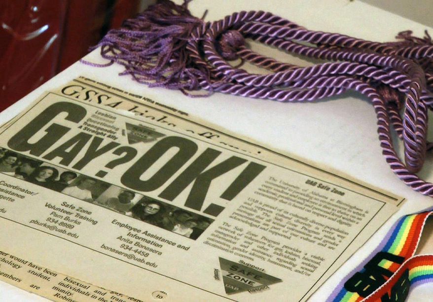 A few of the items donated to the Invisible Histories Project are shown in Birmingham, Ala., on Wednesday, Aug. 15, 2018. The nonprofit group has gathered volumes of information about gay life in Alabama, and it will expand in to Mississippi and Georgia this year. Organizers hope to cover the entire Southeast within a few years. (AP Photo/Jay Reeves)