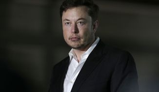 FILE- In this June 14, 2018, file photo, Tesla CEO and founder of the Boring Company Elon Musk speaks at a news conference in Chicago. For years, Tesla’s board remained almost invisible, staying behind the curtain as Musk guided the electric car maker to huge stock price increases. Now, given Musk’s recent questionable behavior, experts say it’s time for the board to step onstage and take action on the company’s leadership. (AP Photo/Kiichiro Sato, File)