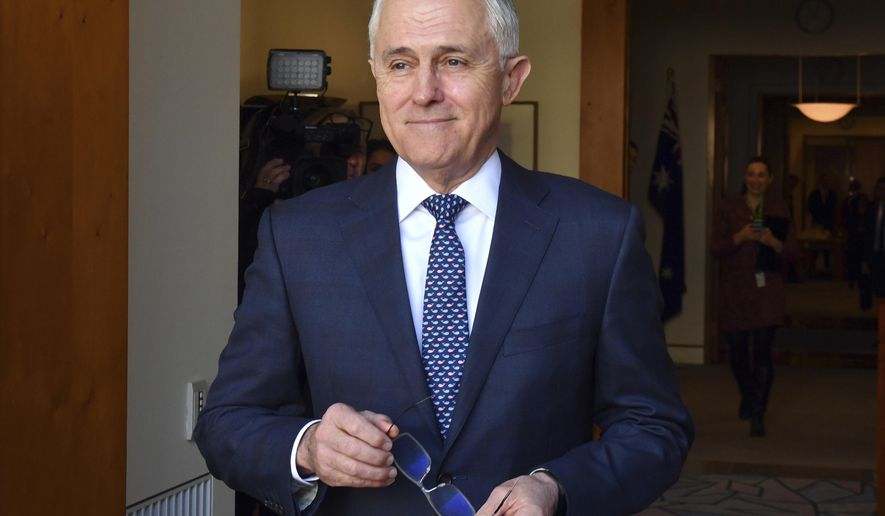 FILE - In this Aug. 20, 2018, file photo, Australia's Prime Minister Malcolm Turnbull arrives for a meeting with Poland's President Andrzej Duda at Parliament House in Canberra. Prime Minister Turnbull has long been under attack from the most conservative element of his party who have always regarded him as too progress to lead an Australian center-right government. The 63-year-old former journalist, lawyer and merchant banker has a history of championing progressive causes including gay marriage, making polluters pay for greenhouse gas emissions and severing constitutional ties with Britain by making Australia a republic. (Mick Tsikas/Pool Photo via AP, File)