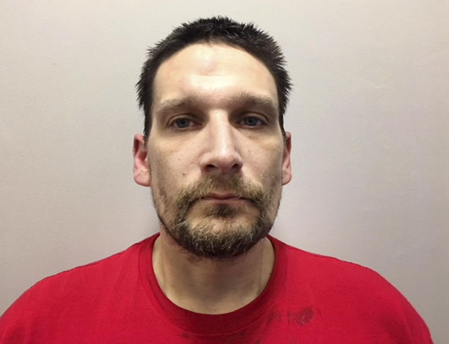 This April 2018 identification photo released by the New Hampshire Attorney General shows Douglas Heath, killed in a shootout with police, Monday, Aug. 20, 2018 in Rochester, N.H. Heath, 38, was wanted on several outstanding warrants, including one for trafficking narcotics and another for fleeing from a Maine trooper. (New Hampshire Attorney General via AP)