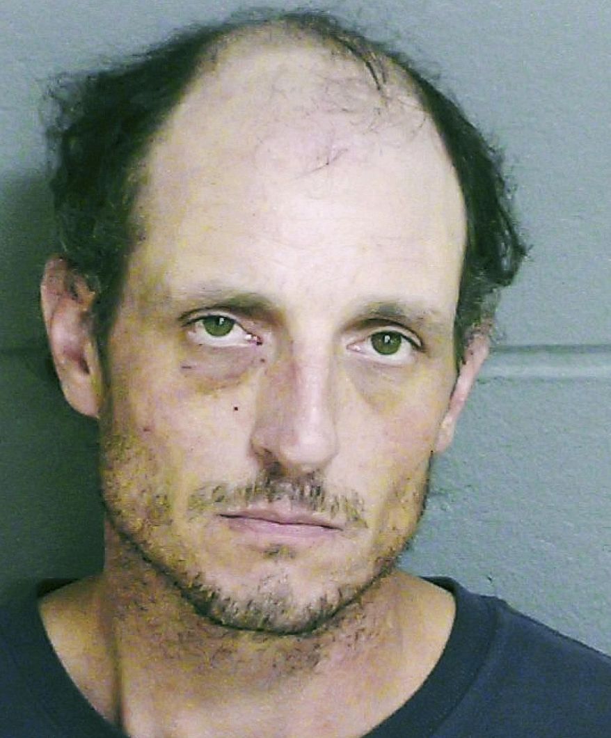 This booking photo released by the Dover, N.H., Police Department shows Jeramie Colella. He is charged with second-degree murder in the deaths of his wife and father, whose bodies were found at a home in Dover on Monday, Aug. 20, 2018. (Dover Police Department via AP)
