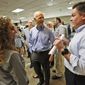 Florida Gov. Rick Scott, center, chats with Secretary of the Florida Department of Transportation (FDOT) Mike Dew, right, and Stacy Miller, left, director of transportation development, after a news conference at the FDOT District Four Office, Wednesday, Aug. 22, 2018, in Fort Lauderdale, Fla. Scott spoke about the SW 10th Street Connector. Scott is challenging three-term Democratic U.S. Sen. Bill Nelson. (AP Photo/Wilfredo Lee) ** FILE **