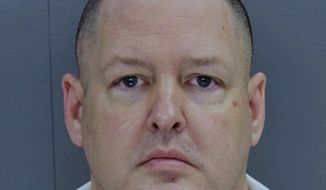 File-This file photo provided by South Carolina state shows Todd Kohlhepp. Kohlhepp, already in prison for seven murders, claims he has two additional victims. The Greenville News reports Spartanburg County Sheriff Chuck Wright confirmed Tuesday, Aug. 21, 2018, that Kohlhepp has told investigators that two people are buried near Interstate 26 in the Enoree area of southern Spartanburg County. ( South Carolina state via AP, File)