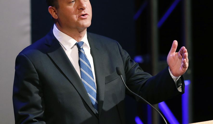In this June 18, 2018 file photo Colorado Democratic gubernatorial candidate Jared Polis responds to a question during a televised debate in Denver, Colo. Polis outlined his energy policy Wednesday, Aug. 22, 2018, at a meeting of the Colorado Oil and Gas Association in Denver. Polis said the oil and gas industry is vital to Colorado's economy but the state has to address persistent conflicts between the industry and neighborhoods. (AP Photo/David Zalubowski,File)