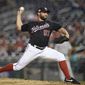 Washington Nationals starting pitcher Tanner Roark delivers a pitch during the third inning of a baseball game against the Philadelphia Phillies, Tuesday, Aug. 21, 2018, in Washington. (AP Photo/Nick Wass) ** FILE **