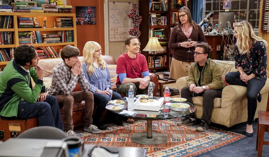 This image released by CBS shows Kunal Nayyar, from left, Simon Helberg, Melissa Rauch, Jim Parsons, Mayim Bialik, Johnny Galecki and Kaley Cuoco appear in a scene from the long-running comedy series "The Big Bang Theory." The popular series will end in 2019. (Erik Voake/CBS via AP)