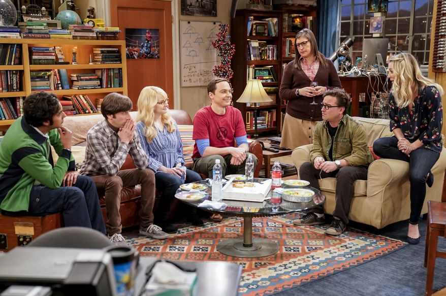This image released by CBS shows Kunal Nayyar, from left, Simon Helberg, Melissa Rauch, Jim Parsons, Mayim Bialik, Johnny Galecki and Kaley Cuoco appear in a scene from the long-running comedy series "The Big Bang Theory." The popular series will end in 2019. (Erik Voake/CBS via AP)