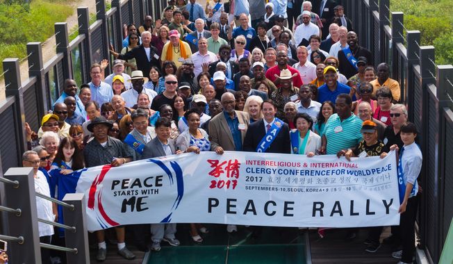 More than 200 American faith leaders gathered at the Demilitarized Zone separating the Koreas to pray for peace. (PHOTO CREDIT: HSA-UWC)