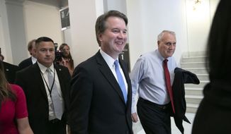 President Donald Trump&#39;s Supreme Court nominee, Judge Brett Kavanaugh, departs after meeting with Sen. Chris Coons, D-Del., a member of the Senate Judiciary Committee which will oversee his confirmation, on Capitol Hill in Washington, Thursday, Aug. 23, 2018. (AP Photo/J. Scott Applewhite)
