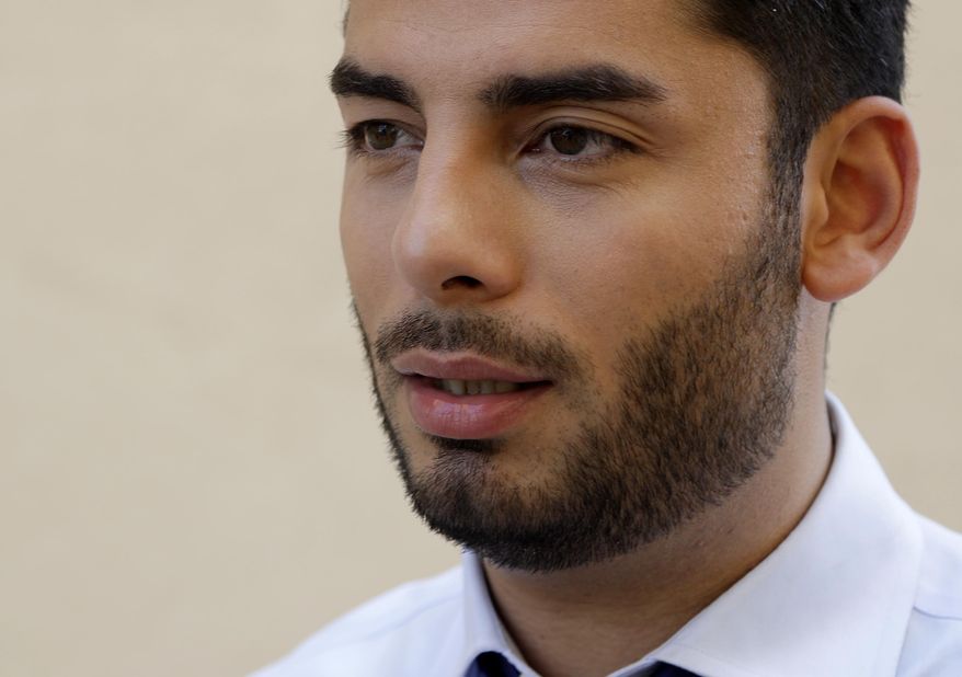 Democratic congressional candidate Ammar Campa-Najjar speaks during an interview Wednesday, Aug. 22, 2018, in San Diego. Despite an ongoing FBI investigation into his campaign spending, Campa-Najjar's competitor, U.S. Rep. Duncan Hunter, coasted through the June primary election largely unscathed. But on Tuesday, the Republican congressman and his wife were charged by a federal grand jury with using more than $250,000 in campaign funds for personal gain. The indictment brings a jolt of uncertainty into the contest, in a year when Democrats have targeted a string of Republican-held House seats across the state. (AP Photo/Gregory Bull)