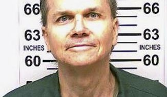FILE- This Jan. 31, 2018 photo, provided by the New York State Department of Corrections, shows Mark David Chapman, the man who killed John Lennon on Dec. 8, 1980. The New York State Parole Board has denied Chapman, 63, parole for a 10th time on Thursday, Aug. 23, 2018. He will be eligible for parole again in 2020.  (New York State Department of Corrections via AP)