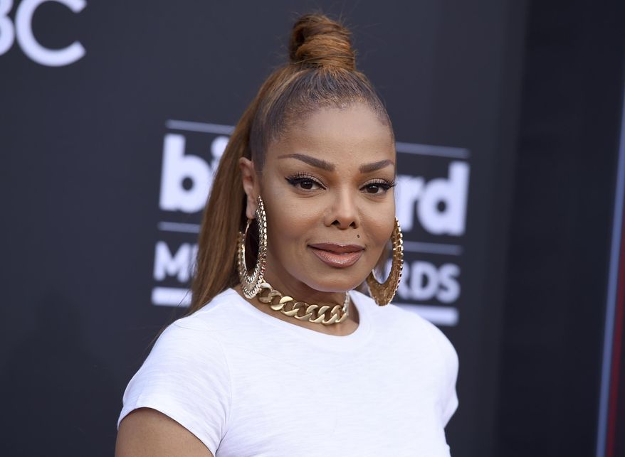 FILE - In this May 20, 2018, file photo, Janet Jackson arrives at the Billboard Music Awards at the MGM Grand Garden Arena in Las Vegas. Jackson will receive the rock star award at the 2018 Black Girls Rock awards. Organizers on Thursday, Aug. 23, announced the Grammy winner will be honored as a “phenomenal women in music.” (Photo by Jordan Strauss/Invision/AP, File)