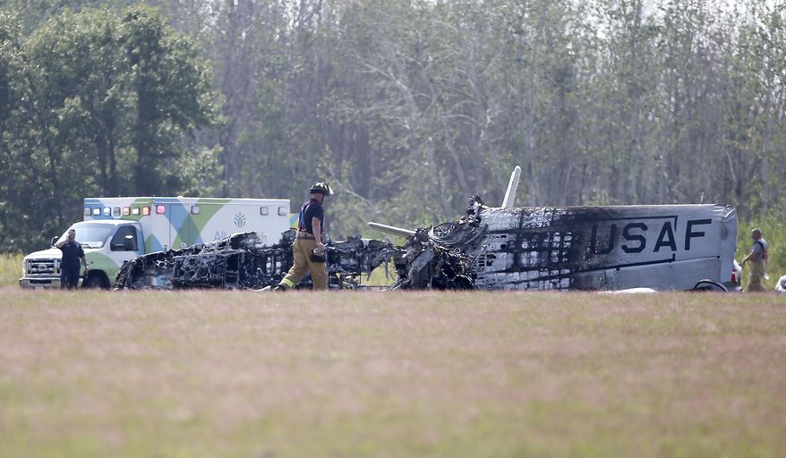 A vintage military airplane crashed and exploded Thursday, Aug. 23, 2018, at the Anoka County Airport in Blaine, Minn. Blaine Police Chief Brian Podany told reporters the pilot suffered serious injuries but is expected to recover. He was taken to a hospital. The pilot's name was not immediately released, but Podany says he's a 65-year-old from Ham Lake with more than 20 years of experience. (David Joles /Star Tribune via AP)