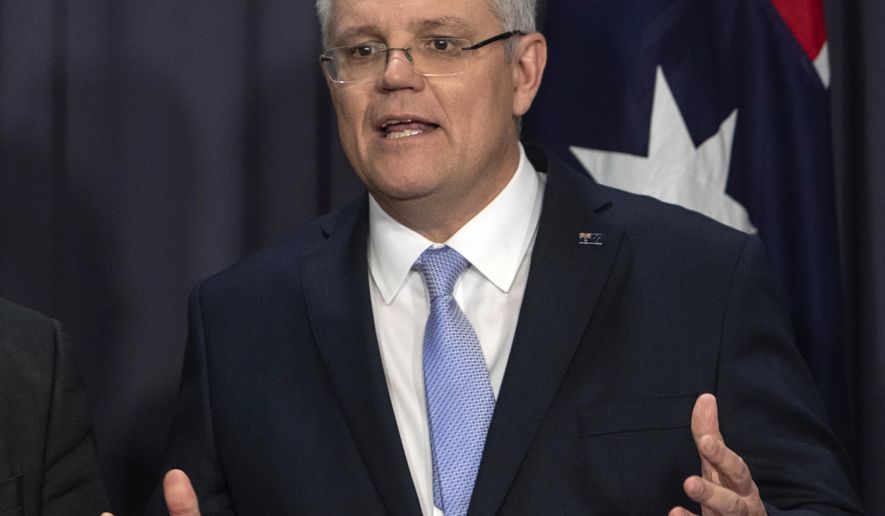 Australia's next Prime Minister Scott Morrison speaks during a press conference at Parliament House in Canberra, Friday, Aug. 24, 2018. Australia government lawmakers on Friday elected Treasurer Morrison as the next prime minister in a ballot that continues an era of extraordinary political instability. (AP Photo/Andrew Taylor)