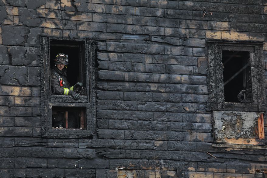 Firefighters continue to work at the Maple Tree Inn, a historic restaurant that was gutted by fire early Friday, Aug. 24, 2018. The fire started around 2 a.m. in the 13300 block of S. Olde Western in the town's historic district. The Maple Tree Inn was founded in 1975. The popular Louisiana-style restaurant has over the years developed a national reputation and OpenTable ranked it this year as one of the 50 Best Southern Restaurants in America. (Zbigniew Bzdak/Chicago Tribune via AP)