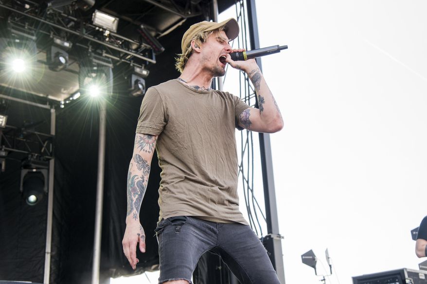 FILE - In this Sunday, May 20, 2018 file photo, Kyle Pavone of We Came As Romans performs at the Rock On The Range Music Festival in Columbus, Ohio. On Saturday, Aug. 25, 2018, the metalcore band said Pavone, their vocalist, is dead at 28. (Photo by Amy Harris/Invision/AP)