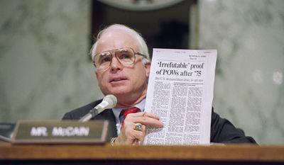 Mr. McCain held up an article from the Washington Times during a hearing of the Senate Select Committee on POW/MIA Affairs on June 24, 1992. The senator never stopped fighting for the return of his comrades.