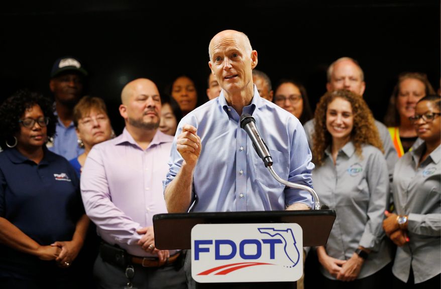 on track to victory: Florida Gov. Rick Scott, a Republican, continues to gain ground and appears to have taken a lead over incumbent Sen. Bill Nelson. (Associated Press/File)