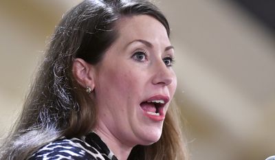 Kentucky Secretary of State Alison Lundergan Grimes speaks during the 26th Annual Wendell Ford Dinner, Saturday, Aug. 18, 2018, in Louisville, Ky. (AP Photo/Timothy D. Easley)