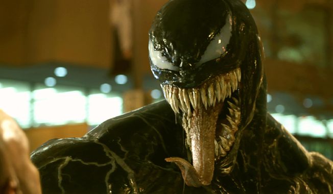 This image released by Sony Pictures shows a scene from "Venom," in theaters on Oct. 5. (Sony Pictures via AP)