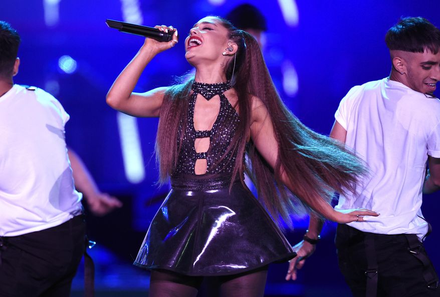 FILE - In this June 2, 2018 file photo, Ariana Grande performs at Wango Tango in Los Angeles. Grande will perform at the funeral for Aretha Franklin on Friday, Aug. 31. (Photo by Chris Pizzello/Invision/AP, File)