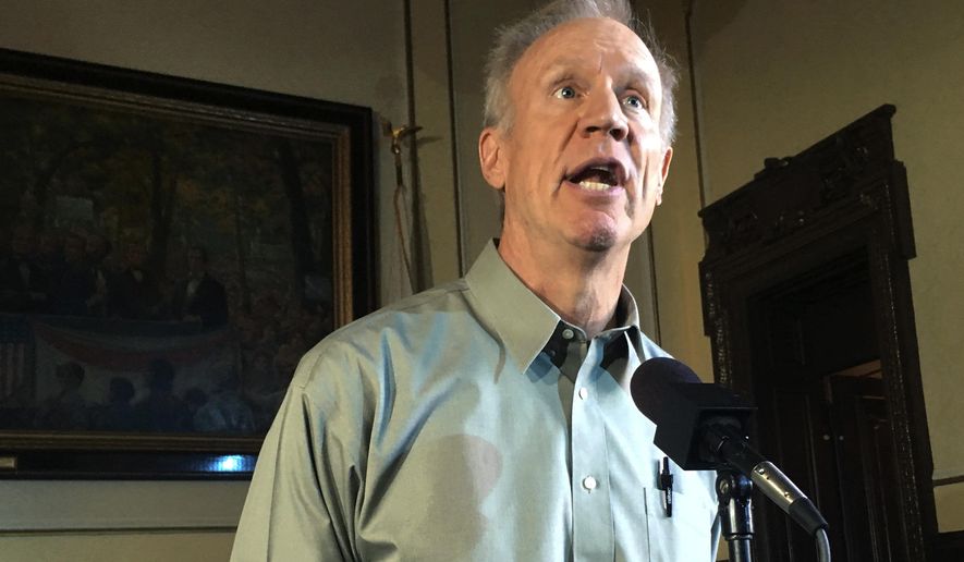 FILE - In this Aug. 9, 2018, file photo, Gov. Bruce Rauner speaks during a news conference in Springfield, Ill. Rauner on Tuesday, Aug. 28, 2018, defended his veto of legislation to hasten paperwork to help immigrant crime victims stay in the U.S. despite earlier approving welfare for immigrants similarly situated. (AP Photo/John O'Connor, File)