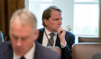 White House counsel Donald McGahn attends a cabinet meeting in the Cabinet Room of the White House, Thursday, Aug. 16, 2018, in Washington. (AP Photo/Andrew Harnik)