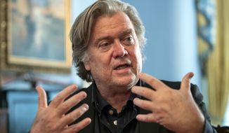 Steve Bannon, President Donald Trump&#39;s former chief strategist, talks about the approaching midterm election during an interview with The Associated Press, Sunday, Aug. 19, 2018, in Washington. Bannon told the Associated Press that if the elections were held today, he believed the GOP would lose 35 to 40 seats and the House of Representatives, but argued there was time to turn that around.  (AP Photo/J. Scott Applewhite)
