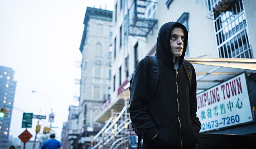 This image released by USA Network shows Rami Malek in a scene from "Mr. Robot." USA Network announced the fourth and final season of the award-winning series will return in 2019. (Michael Parmelee/USA Network via AP)