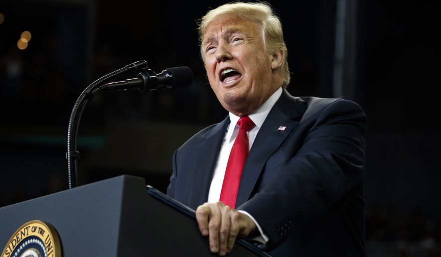 President Donald Trump speaks during a campaign rally at the Ford Center, Thursday, Aug. 30, 2018, in Evansville, Ind. (AP Photo/Evan Vucci)