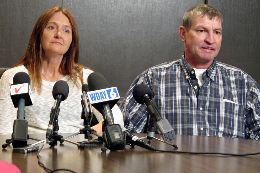 FILE - In this April 15, 2016, file photo, Tammy and John Sadek, parents of Andrew Sadek, a North Dakota college student who was a confidential informant for a drug task force before he turned up dead, talk about the case at a news conference in Fargo, N.D. Trial is set next summer for a wrongful death lawsuit filed by the Sadeks. They sued the Richland County sheriff's department, a deputy and the county over the 2014 death of their 20-year-old son Andrew. (AP Photo/Dave Kolpack, File)