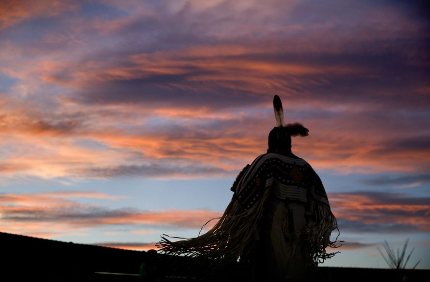 ADVANCE FOR USE WEDNESDAY, SEPT. 5, 2018 AND THEREAFTER-A woman performs a traditional Native American dance during the North American Indian Days celebration on the Blackfeet Indian Reservation in Browning, Mont., Friday, July 13, 2018. North Dakota Democratic Sen. Heidi Heitkamp says Native American women are often subject to high rates of violence. "It becomes a population that you can prey on because no one does anything about it, because there's no deterrence, because there's no enforcement and no prosecution," said Heitkamp, who has introduced a bill aimed at addressing this issue. (AP Photo/David Goldman)