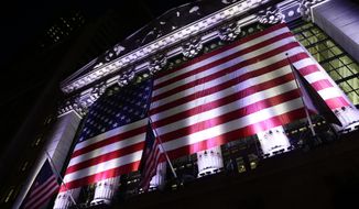 FILE- In this Feb. 17, 2017, file photo an American flag hangs on the front of the New York Stock Exchange in New York. The U.S. stock market opens at 9:30 a.m. EDT on Thursday, Aug. 30, 2018. (AP Photo/Peter Morgan, File)