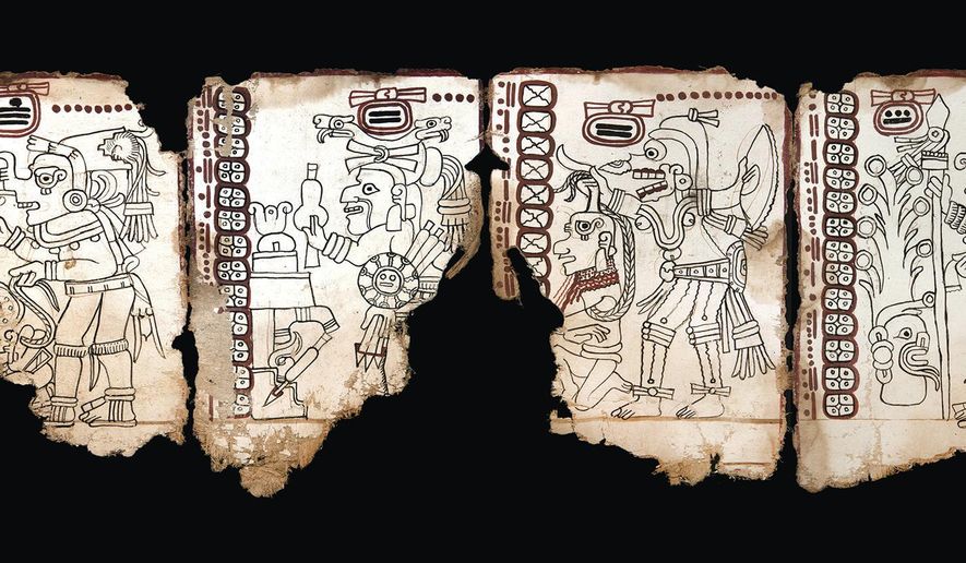 This undated photo released by Mexico's National Anthropology and History Institute (INAH) shows an ancient Maya pictographic text that has been judged authentic by scholars in Mexico City. The INAH says it was made between 1021 and 1154 A.D., is the oldest known pre-Hispanic text, and will now be known as the "Mexico Maya Codex," after known as the "Grolier Codex." (INAH via AP)
