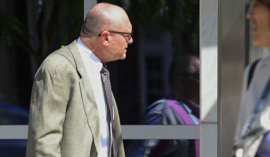 Kevin Wallin, a former Roman Catholic priest, enters the federal courthouse in Hartford, Conn., Thursday Aug. 30, 2018. The disgraced former Bridgeport Diocese priest whose addiction and drug dealing earned him the nickname "Monsignor Meth," was sent back to prison for nine months for failing another drug test while on supervised release. ( Christian Abraham/Hearst Connecticut Media via AP)