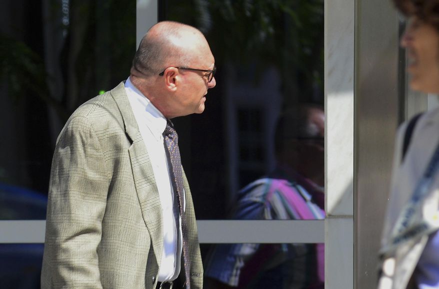 Kevin Wallin, a former Roman Catholic priest, enters the federal courthouse in Hartford, Conn., Thursday Aug. 30, 2018. The disgraced former Bridgeport Diocese priest whose addiction and drug dealing earned him the nickname "Monsignor Meth," was sent back to prison for nine months for failing another drug test while on supervised release. ( Christian Abraham/Hearst Connecticut Media via AP)