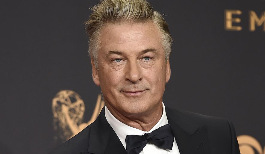 In this Sept. 17, 2017, file photo, Alec Baldwin poses in the press room with the award for outstanding supporting actor in a comedy series for "Saturday Night Live" at the 69th Primetime Emmy Awards in Los Angeles. (Photo by Jordan Strauss/Invision/AP, File)