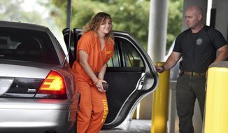 In this Aug. 23, 2018, file photo, Reality Winner arrives at a courthouse in Augusta, Ga., after she pleaded guilty in June to copying a classified U.S. report and mailing it to an unidentified news organization. Winner is thanking President Donald Trump for tweeting about her case. In a Thursday, Aug. 30, telephone interview from a Georgia jail, Winner told “CBS This Morning” that Trump’s tweet was a “breath of fresh air” and that it made her laugh. Trump had tweeted Aug. 24 that Winner’s crime is “small potatoes” compared with “what Hillary Clinton did.” (Michael Holahan/The Augusta Chronicle via AP, File)