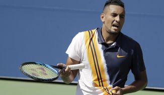 Nick Kyrgios, of Australia, talks to himself during a match 180against Pierre-Hugues Herbert, of France, during the second round of the U.S. Open tennis tournament, Thursday, Aug. 30, 2018, in New York. (AP Photo/Seth Wenig)