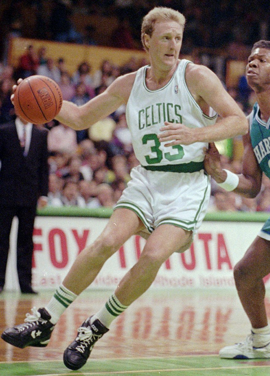 Larry Bird, Boston Celtics (1997-2000) Boston Celtics Larry Bird drives against Charlotte Hornets forward J.R. Reid in a game at the Boston Garden in Boston, Nov. 7, 1991. Bird, who led the Boston Celtics to three NBA championships and had been an adviser for the team since retiring in 1992, has agreed to coach the Indiana Pacers. (AP Photo/Ed Nessen)