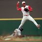 Barry Larkin, Cincinnati Reds (1986-2004) Cincinnati Reds shortstop Barry Larkin forces out Pittsburgh Pirates&#x27; Kevin Polcovich during a failed double play attempt in the third inning Tuesday night, June 10, 1997, at Cinergy Field in Cincinnati. Cincinnati won 8-5. (AP Photo/Tom Uhlman)