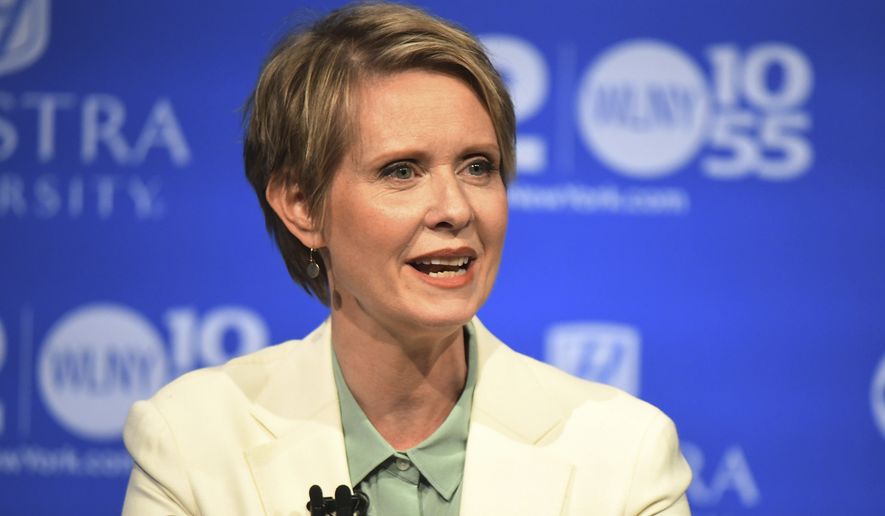 In the Aug. 29, 2018, file photo, Cynthia Nixon, Democratic hopeful for the New York Governor's Office, speaks at the Democratic gubernatorial primary at Hofstra University in Hempstead, N.Y. Nixon is taking her campaign for governor upstate as the Democratic primary nears, making stops in Rochester, Syracuse, Ithaca, Schenectady and Saratoga Springs on Friday, Aug. 31, and throughout the long Labor Day weekend. (J. Conrad Williams Jr./Newsday via AP, Pool)