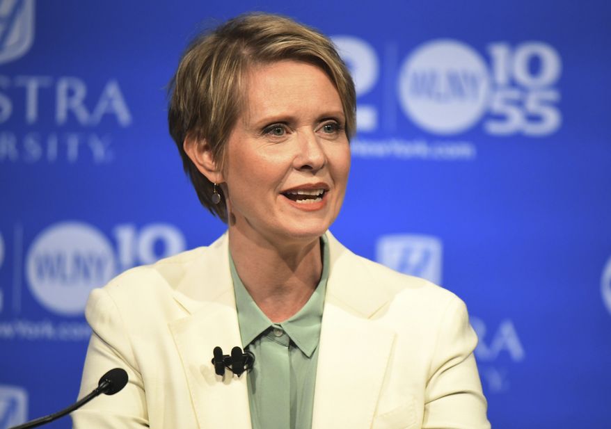 In the Aug. 29, 2018, file photo, Cynthia Nixon, Democratic hopeful for the New York Governor&#39;s Office, speaks at the Democratic gubernatorial primary at Hofstra University in Hempstead, N.Y. Nixon is taking her campaign for governor upstate as the Democratic primary nears, making stops in Rochester, Syracuse, Ithaca, Schenectady and Saratoga Springs on Friday, Aug. 31, and throughout the long Labor Day weekend. (J. Conrad Williams Jr./Newsday via AP, Pool)